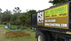 Photo of CSI Natural donating/delivering compost to Elk's Lodge Garden Project.